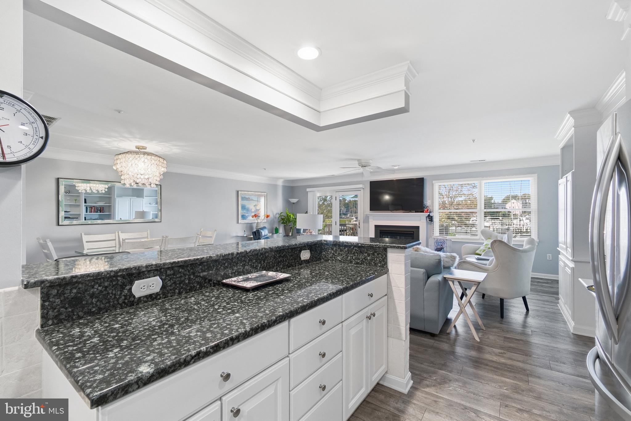 906 Auckland Way Chester, MD 21619 - Photo 5 of 36 Kitchen view to family room and marina