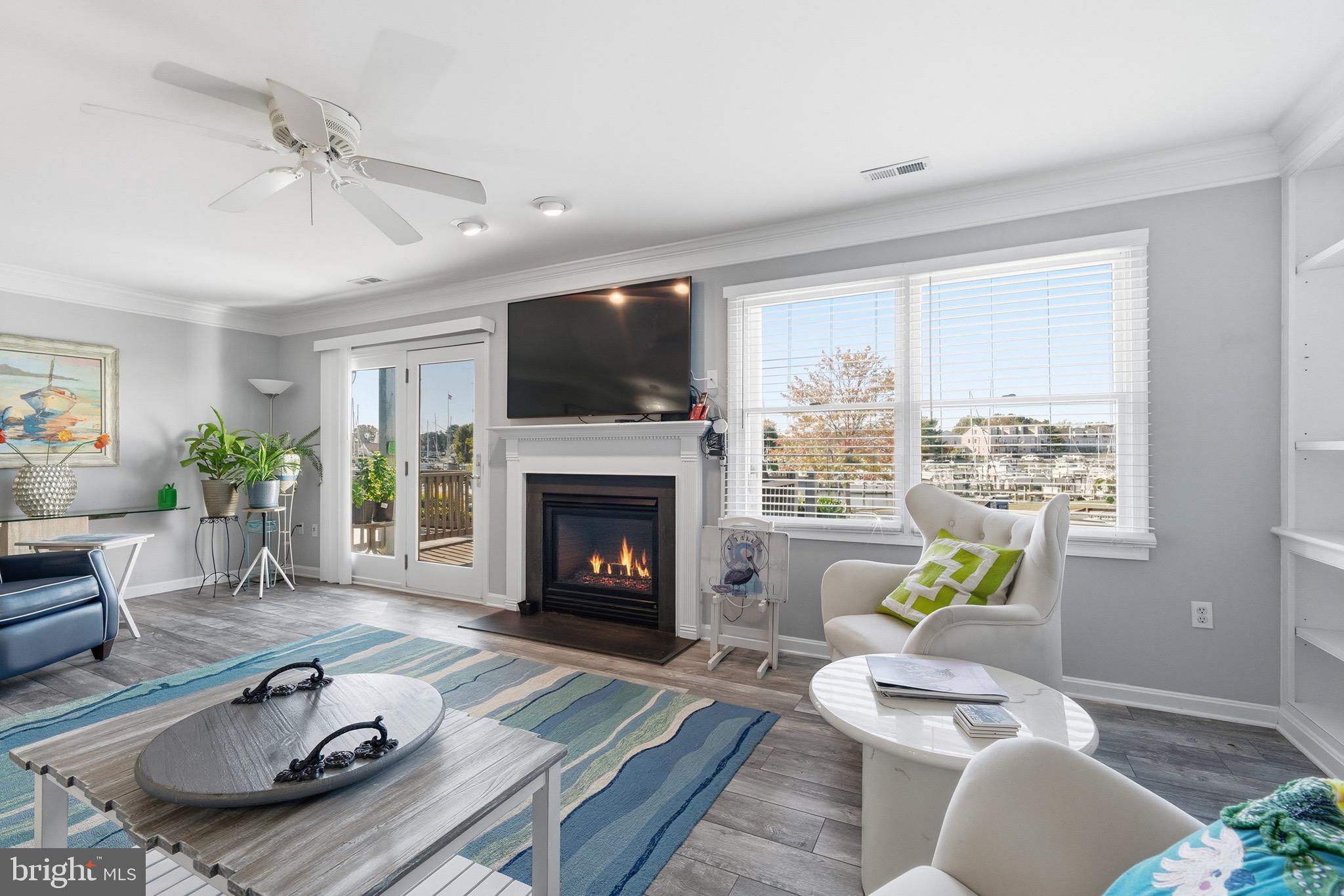 906 Auckland Way Chester, MD 21619 - Photo 8 of 36 Family room with gas fireplace