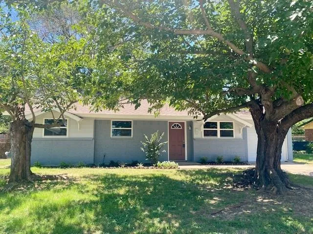 front view of house with a yard