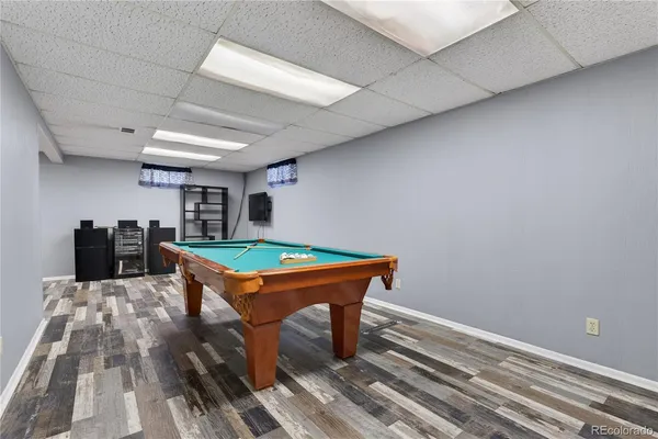a room with furniture and a rug