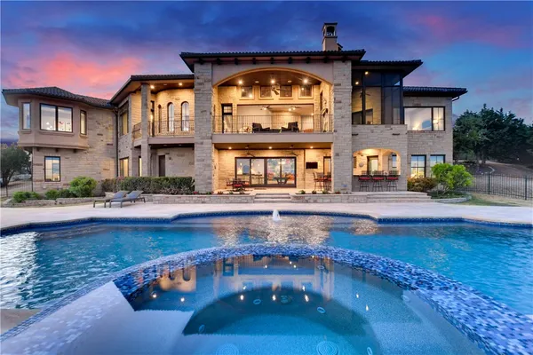 a view of a building with a swimming pool