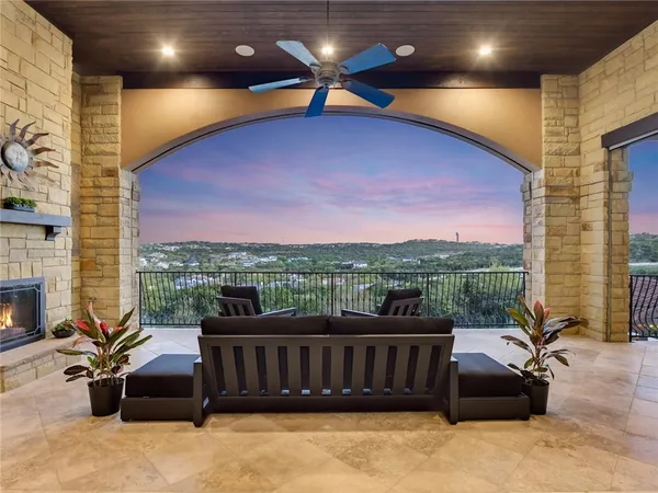 a view of a balcony with furniture