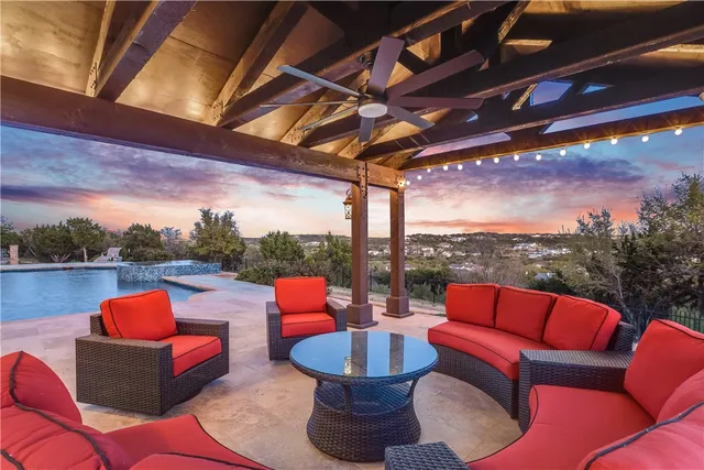a outdoor space with patio couches coffee table and chairs