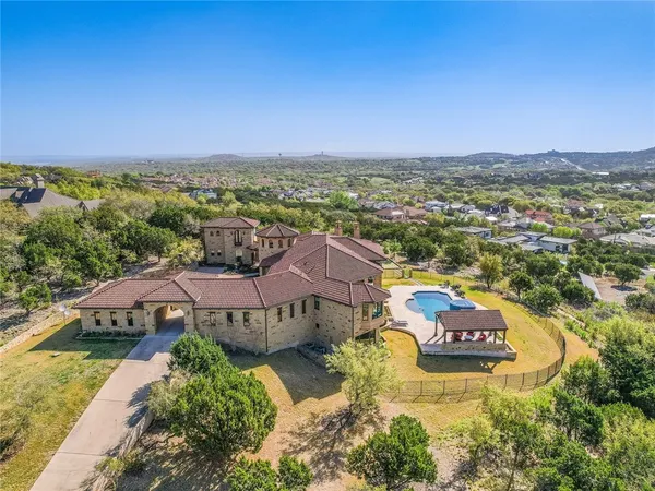 an aerial view of a house with a garden