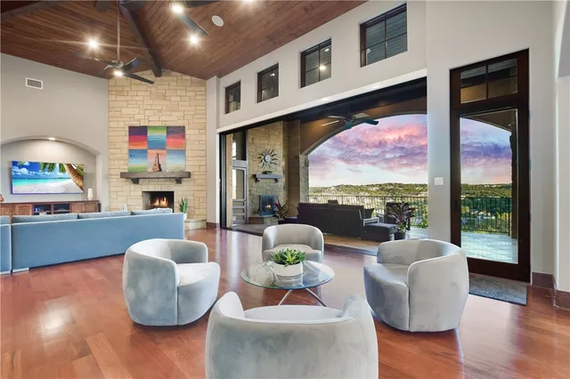 a living room with furniture and a large window