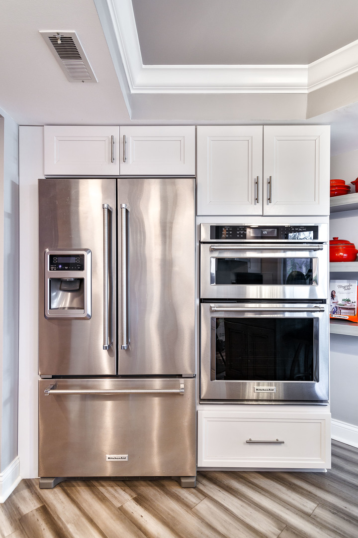 1389 Perry Street, Unit 303 Des Plaines, IL 60016 - Photo 13 of 25 a white refrigerator freezer and a stove sitting inside of kitchen
