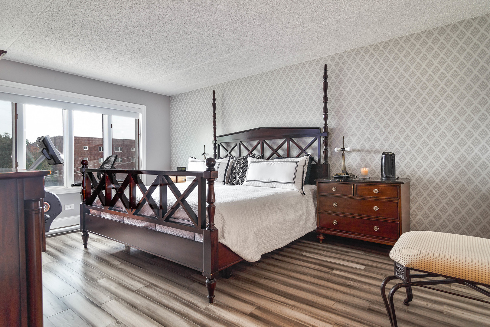 1389 Perry Street, Unit 303 Des Plaines, IL 60016 - Photo 14 of 25 a bedroom with a bed and wooden floor