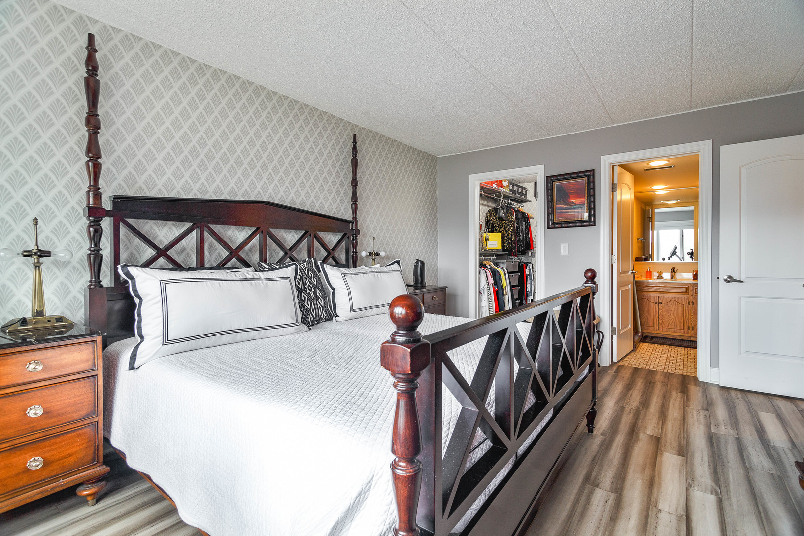 1389 Perry Street, Unit 303 Des Plaines, IL 60016 - Photo 15 of 25 a view of a hallway with wooden floor and staircase