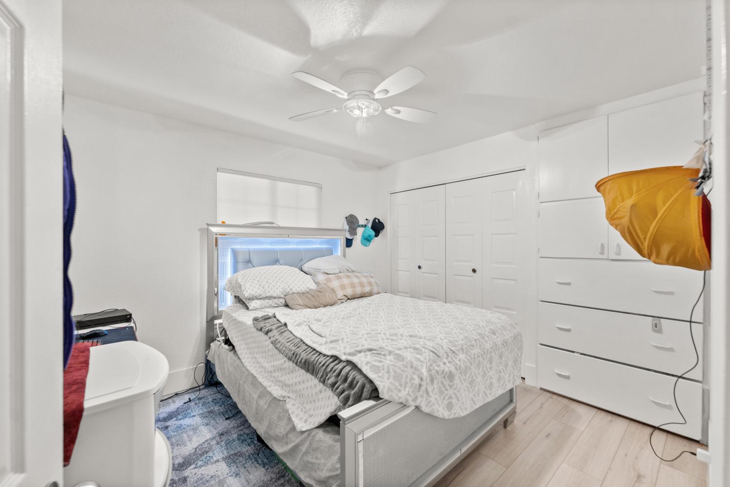 8850 Bader Road Elk Grove, CA 95624 - Photo 29 of 43 a bedroom with a bed and a mirror