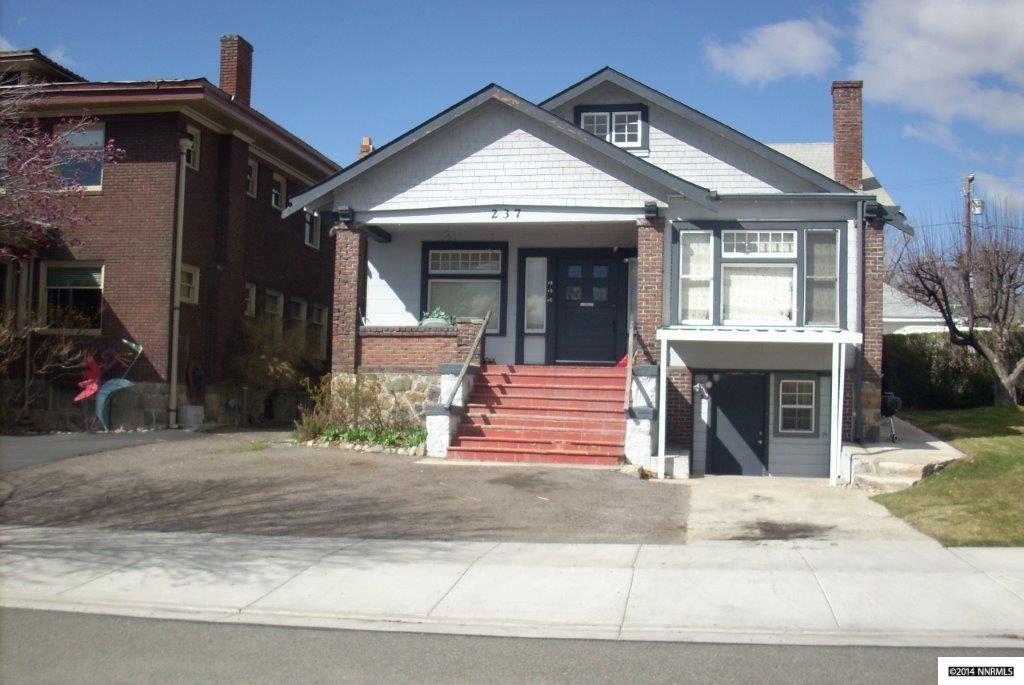 237 Clay Street Reno, NV 89501 - Photo 1 of 1 a front view of a house with a garden and plants
