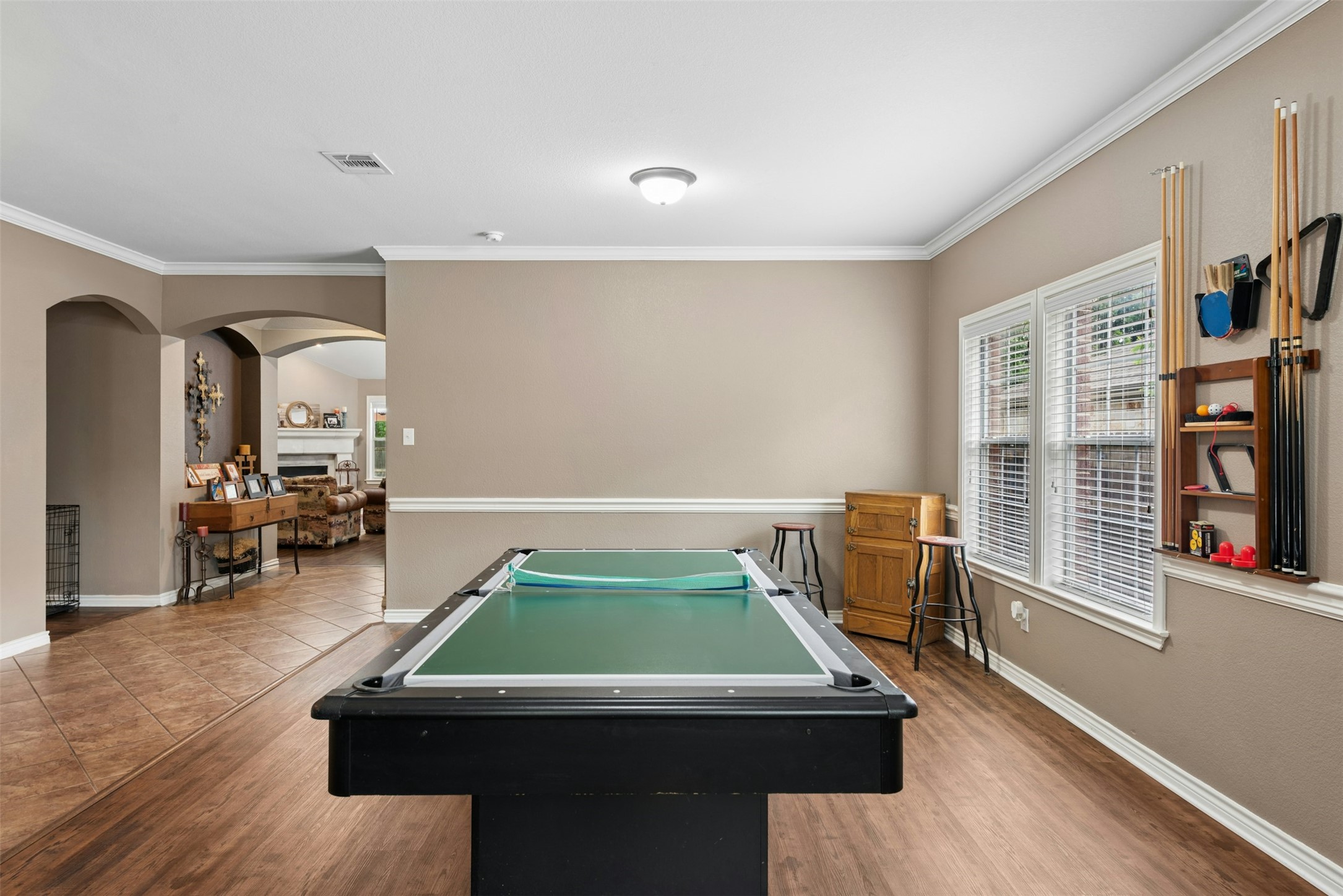 30013 Edgewood Drive Georgetown, TX 78628 - Photo 5 of 39 This versatile room can be used as a Formal Dining/Living Room or Game Room as you see in this photo. Lovely, easy care vinyl plank flooring.