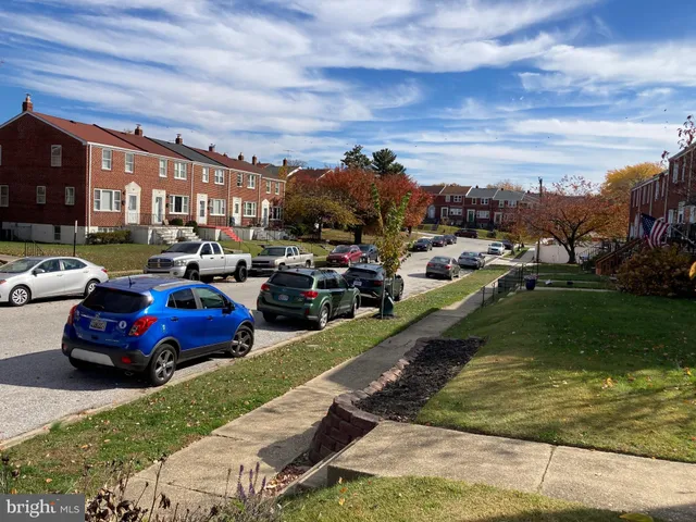 a view of a street with cars