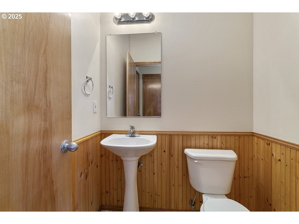 3021 Southeast Pheasant Avenue Gresham, OR 97080 - Photo 11 of 26 a bathroom with a sink and a mirror