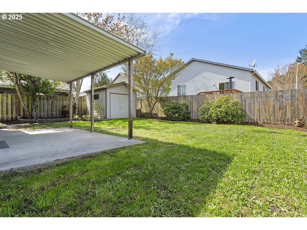 3021 Southeast Pheasant Avenue Gresham, OR 97080 - Photo 23 of 26 a view of a back yard of the house