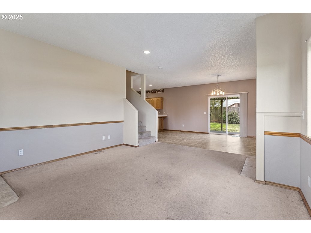 3021 Southeast Pheasant Avenue Gresham, OR 97080 - Photo 4 of 26 a view of an empty room with a window