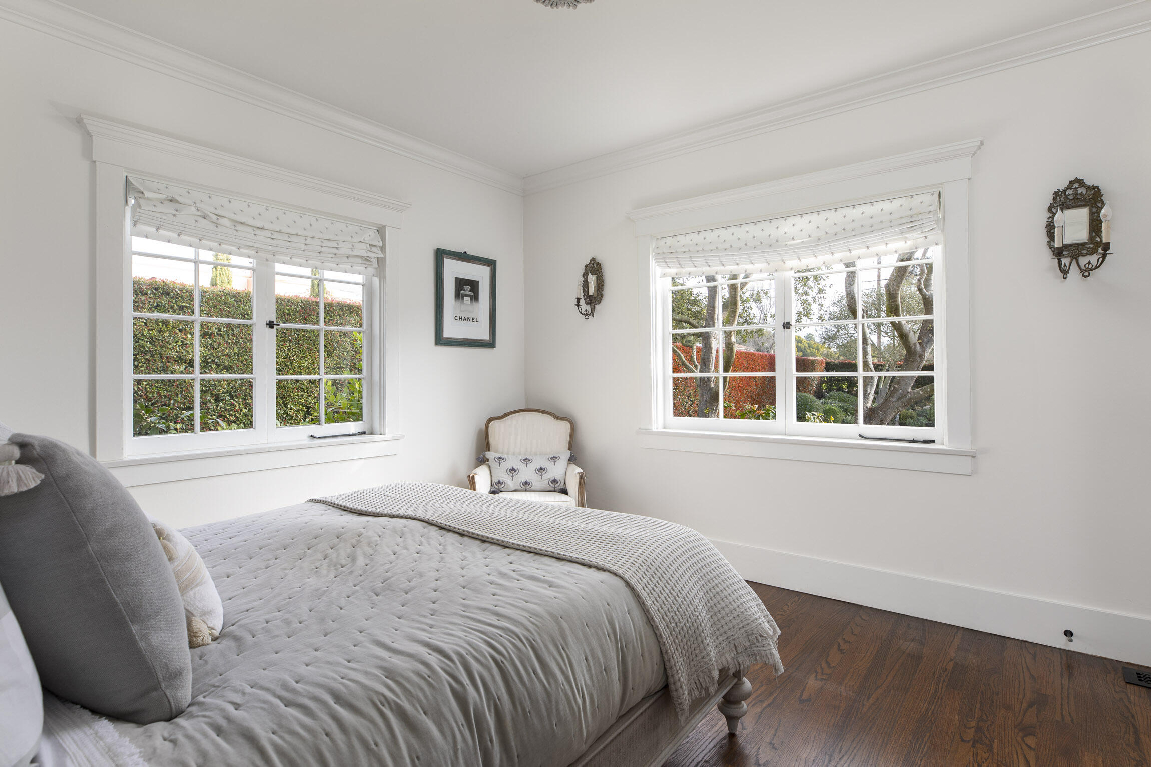 199 Ocean View Avenue Carpinteria, CA 93013 - Photo 14 of 22 a bedroom with a bed and a window