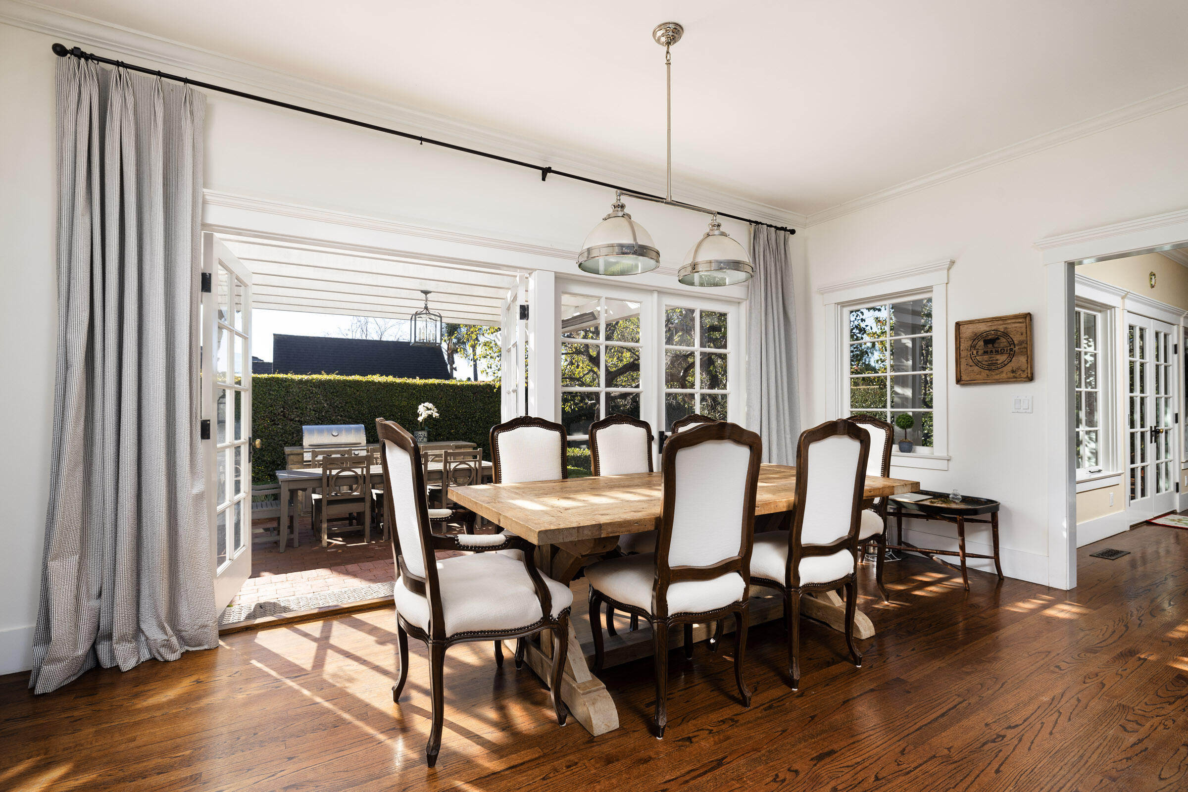 199 Ocean View Avenue Carpinteria, CA 93013 - Photo 6 of 22 a dining room with furniture window and wooden floor