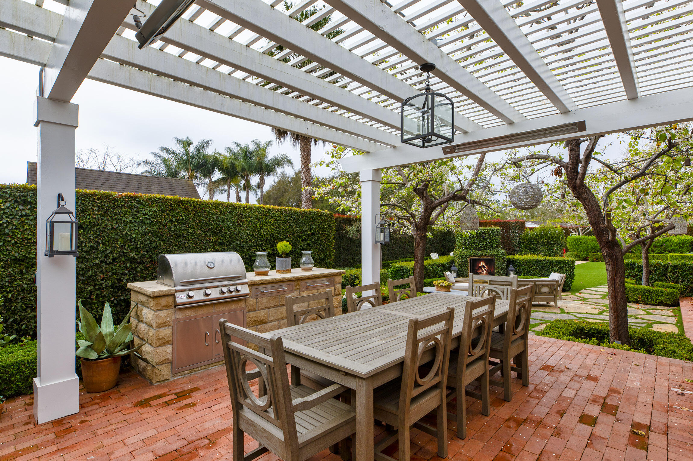 199 Ocean View Avenue Carpinteria, CA 93013 - Photo 7 of 22 a view of an outdoor space with furniture and garden view