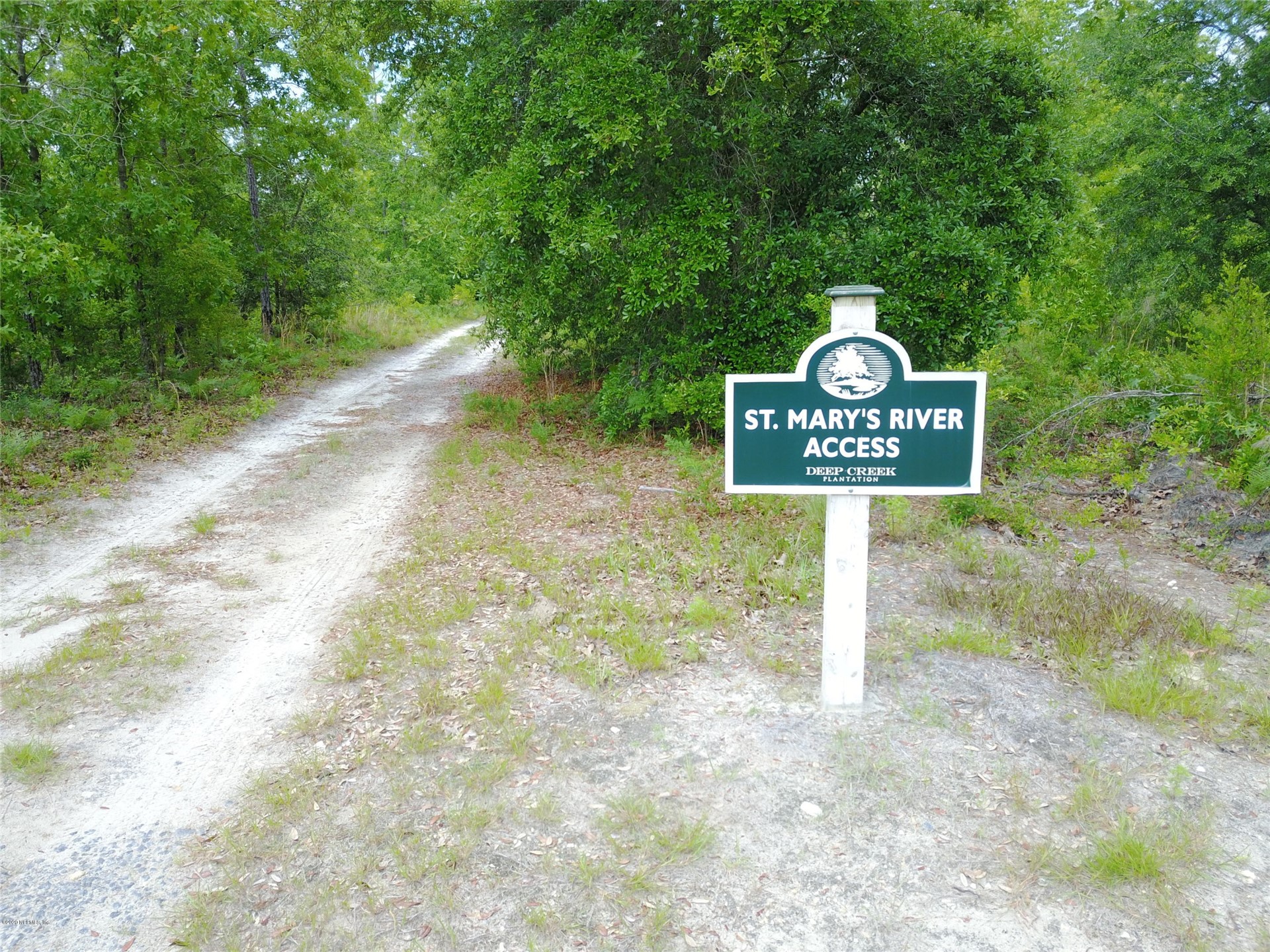 15433 Bullock Bluff Road Bryceville, FL 32009 - Photo 13 of 17 a sign that is on the side of a road