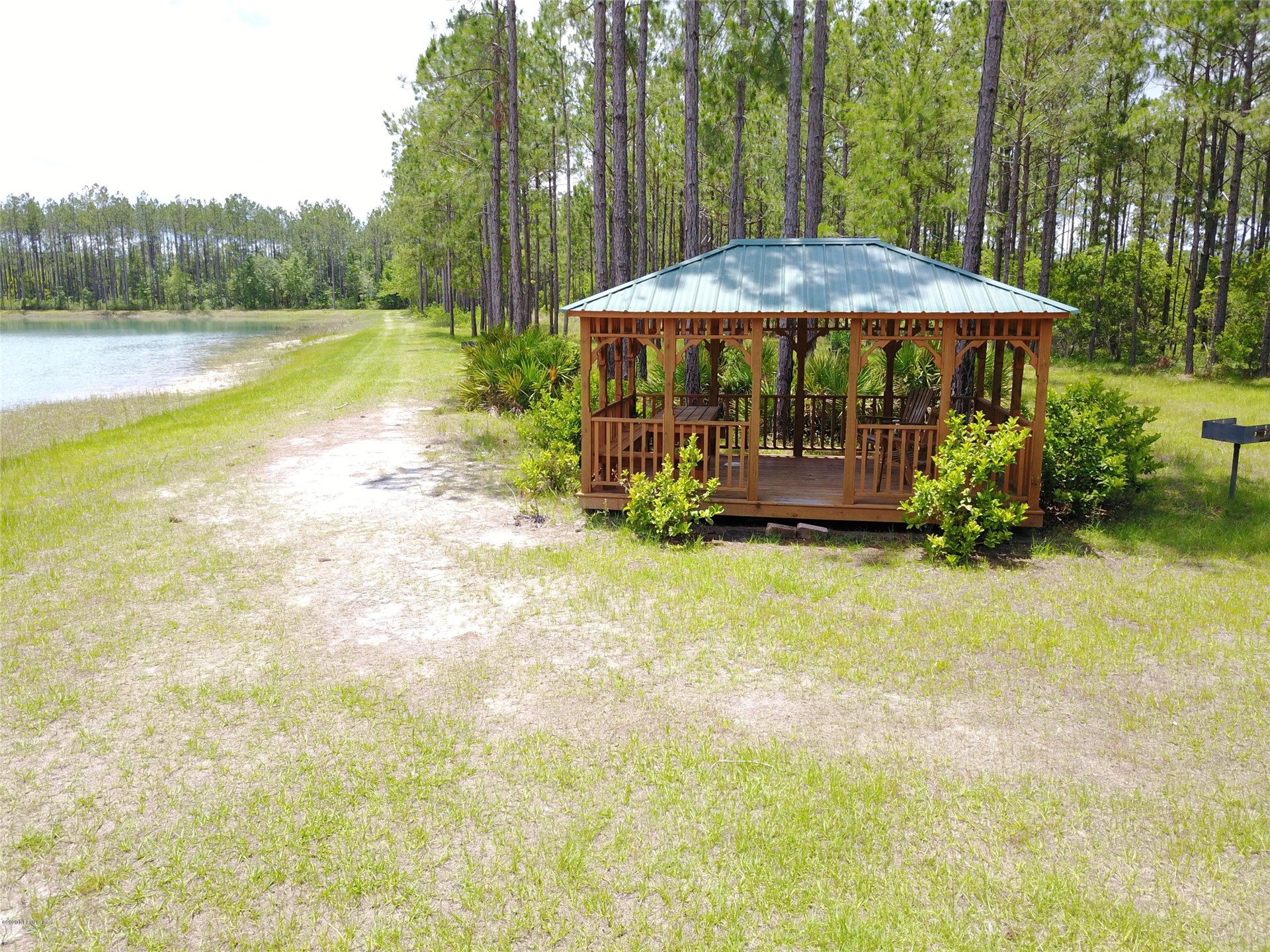 15433 Bullock Bluff Road Bryceville, FL 32009 - Photo 9 of 17 swimming pool view with a seating space
