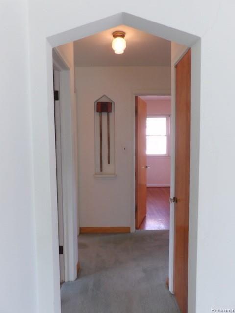 14841 Champaign Road Allen Park, MI 48101 - Photo 22 of 41 22. ARCHWAY TO HALL WITH LINEN CLOSET + RECESSED NOOK FOR PICS & OR COLLECTIBLES!