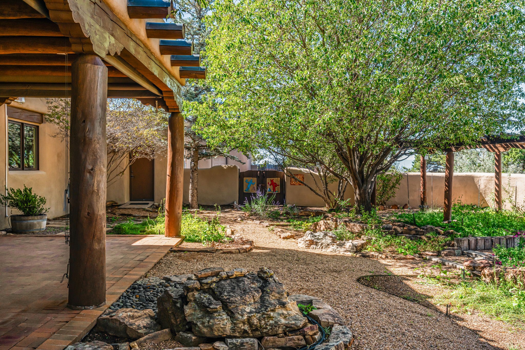 10 Antigua Road Santa Fe, NM 87508 - Photo 44 of 57 Rear portal and lush grounds