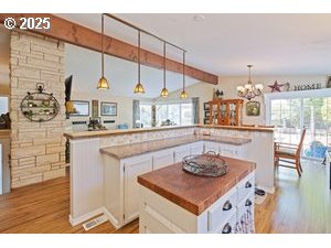 845 Northwest 3rd Street Gresham, OR 97030 - Photo 11 of 32 a kitchen with a table and chairs