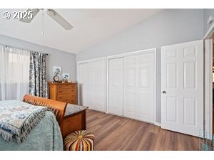 845 Northwest 3rd Street Gresham, OR 97030 - Photo 14 of 32 a bedroom with a bed and a cabinet