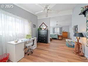 845 Northwest 3rd Street Gresham, OR 97030 - Photo 16 of 32 a living room with furniture and a wooden floor