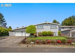 845 Northwest 3rd Street Gresham, OR 97030 - Photo 2 of 32 a view of a house with a yard