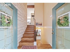 845 Northwest 3rd Street Gresham, OR 97030 - Photo 5 of 32 a view of a bedroom with wooden floor and windows