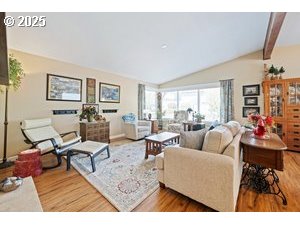 845 Northwest 3rd Street Gresham, OR 97030 - Photo 7 of 32 a living room with furniture and a large window