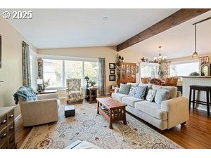 845 Northwest 3rd Street Gresham, OR 97030 - Photo 8 of 32 a living room with furniture and a large window