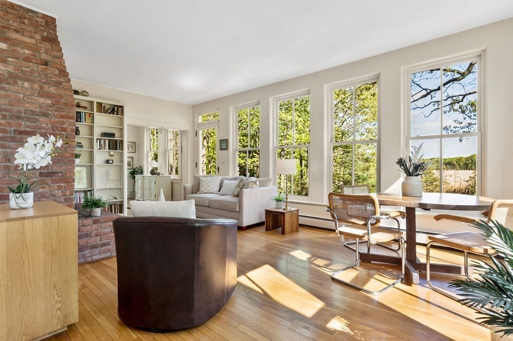 61 Boston Road Newbury, MA 01951 - Photo 8 of 40 a living room with furniture and large windows