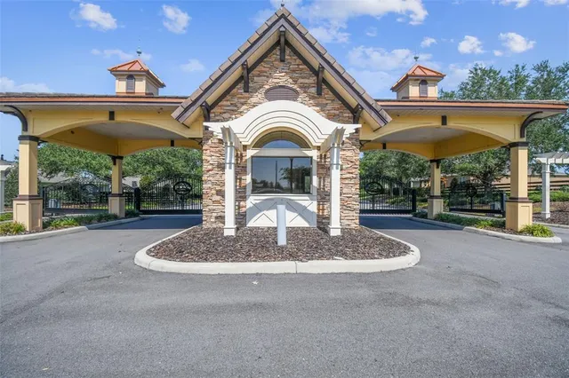 a view of a water fountain in front of a house