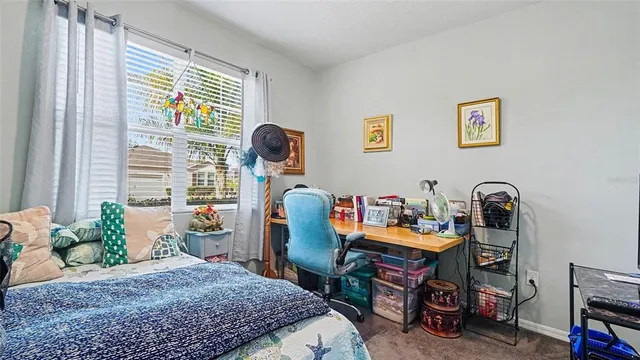 a room with a bed and a table