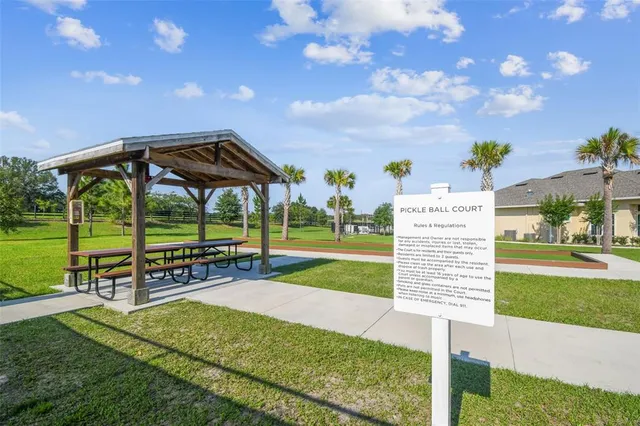 an aerial view of a house with a lake view
