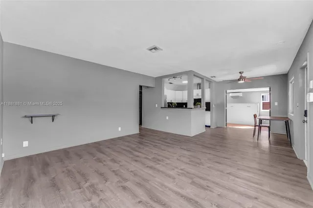 a view of kitchen with livingroom and furniture