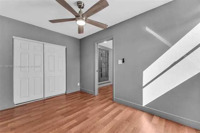 a bathroom with a sink a toilet and a shower