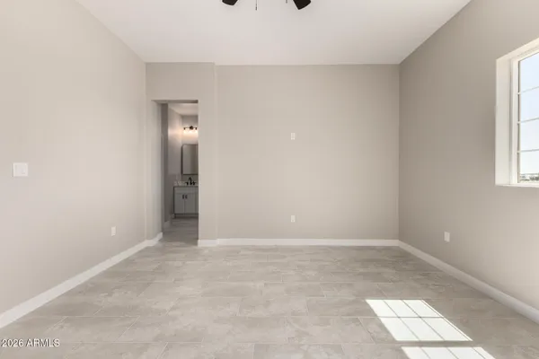 an empty room with windows