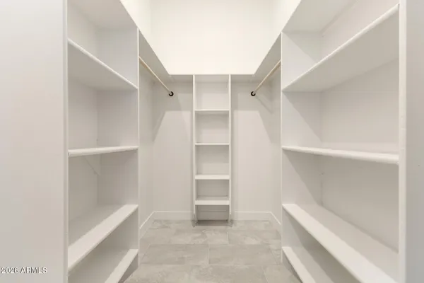 a view of an empty walk in closet