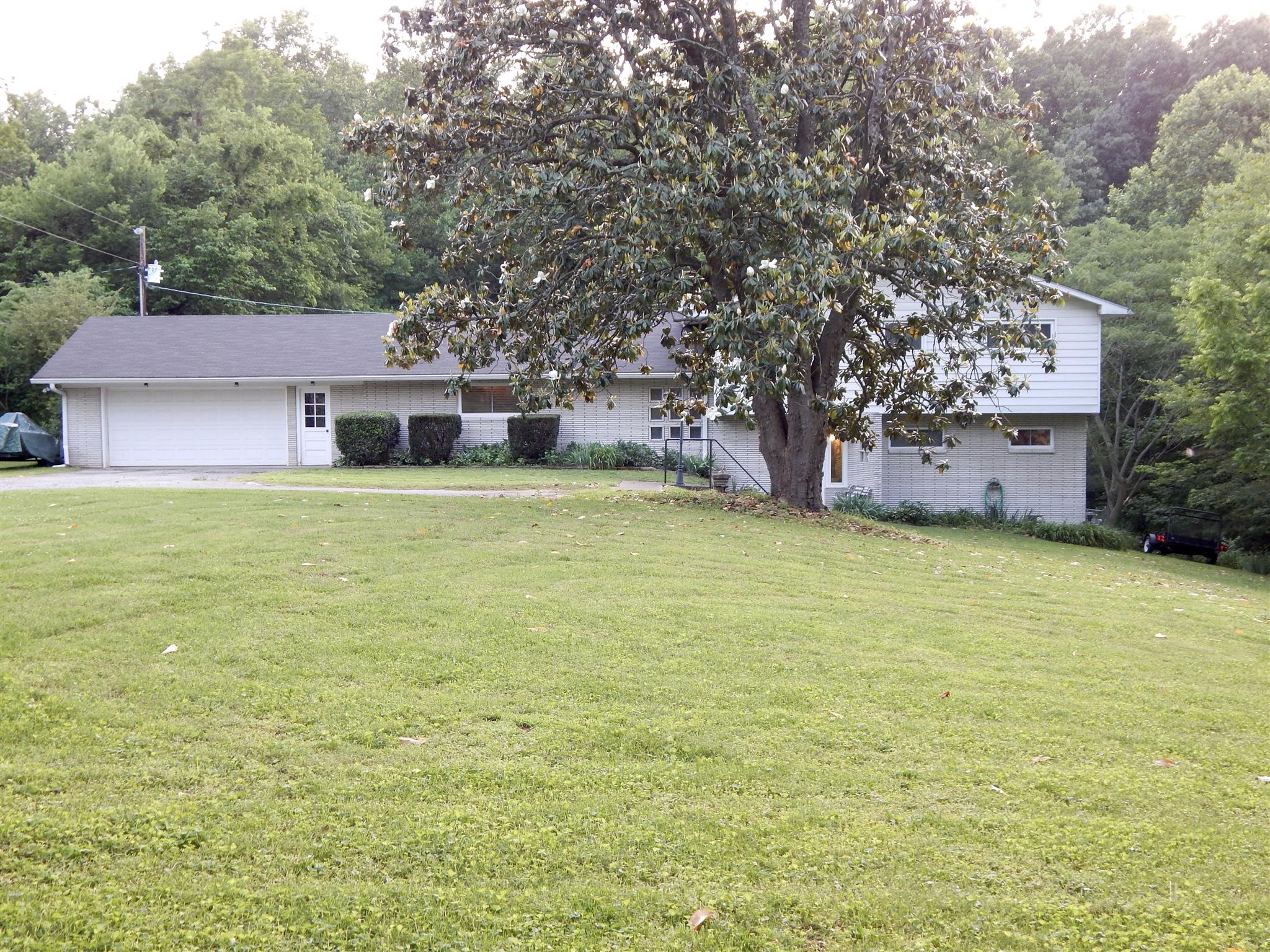 3617 Academy Road Portland, TN 37148 - Photo 2 of 27 a house view with a garden space