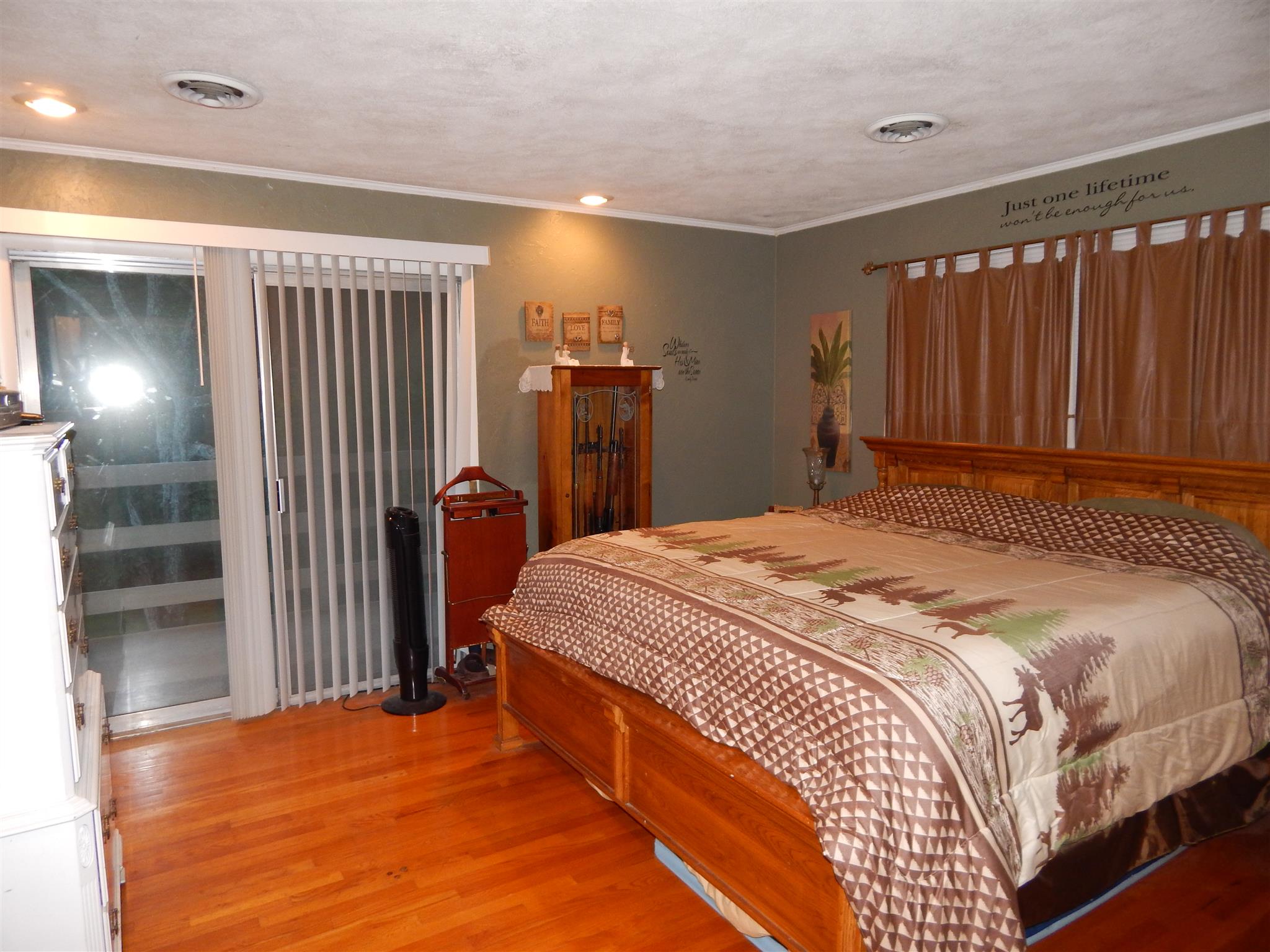 3617 Academy Road Portland, TN 37148 - Photo 21 of 27 a bedroom with a bed and a mirror