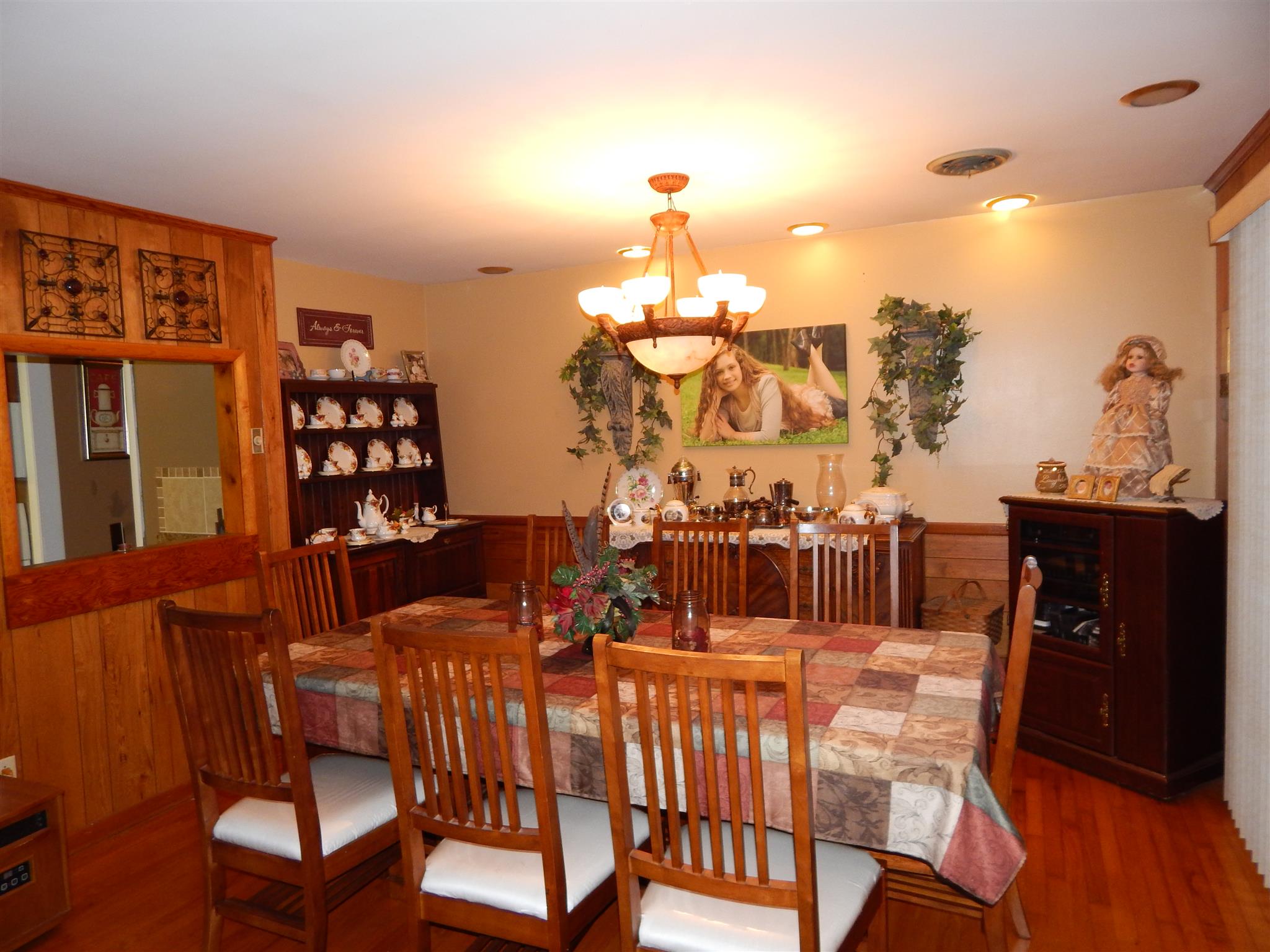 3617 Academy Road Portland, TN 37148 - Photo 5 of 27 a view of a dining room with furniture and wooden floor