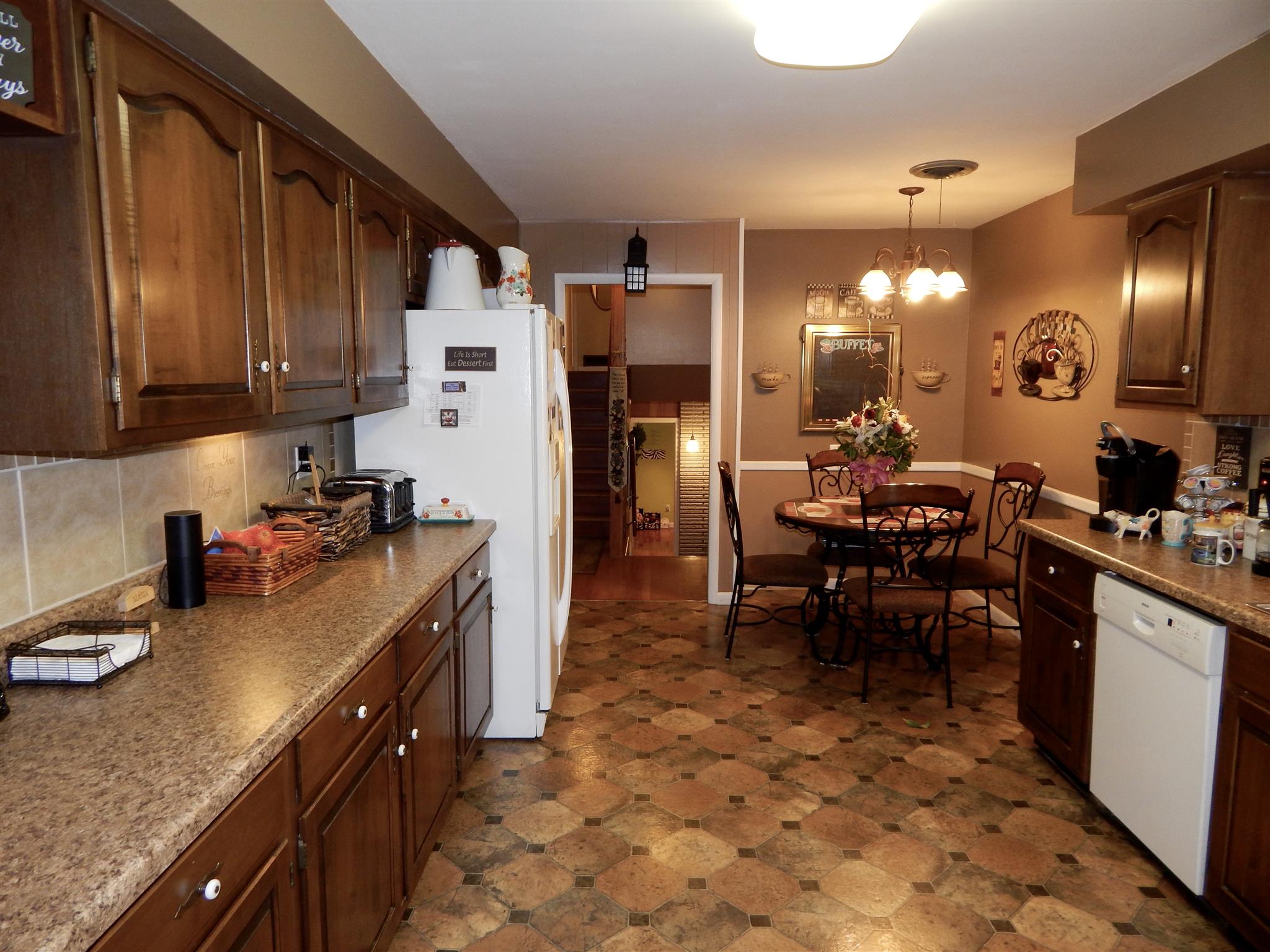 3617 Academy Road Portland, TN 37148 - Photo 8 of 27 a kitchen with granite countertop a sink stove and cabinets