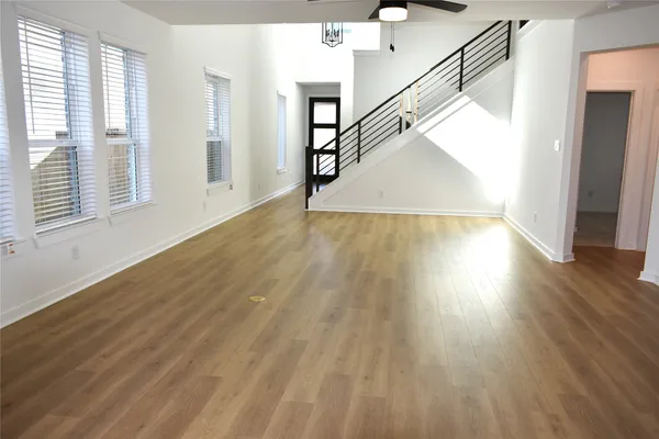 a view of an entryway with wooden floor