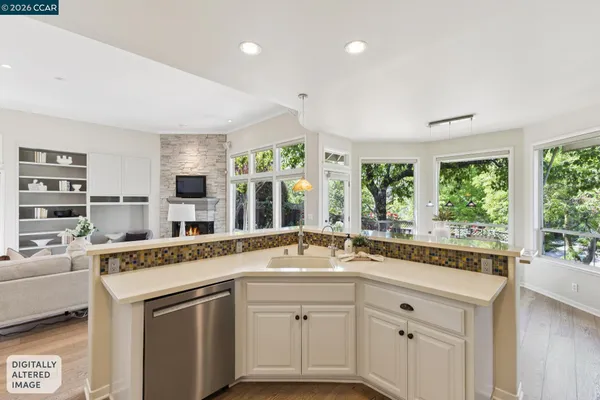 a bedroom with two beds and a table