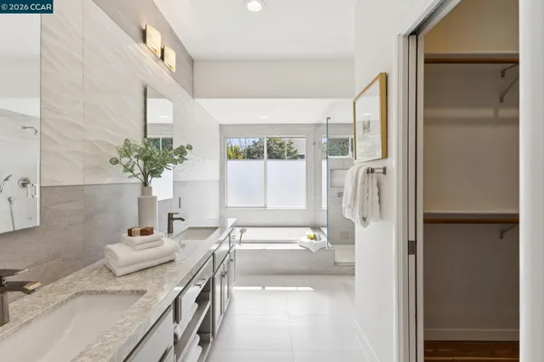 a view of a chair and tables in the garden