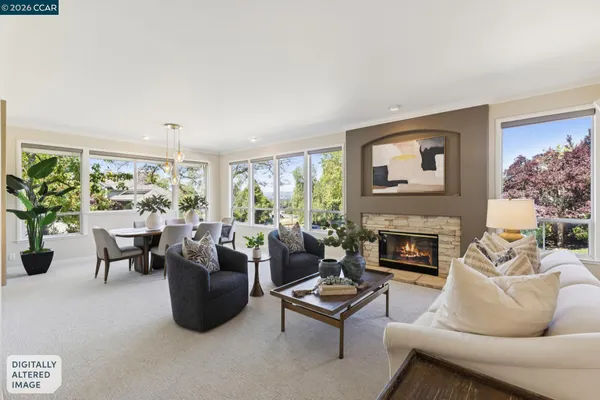 a view of a dining room with furniture window and outside view