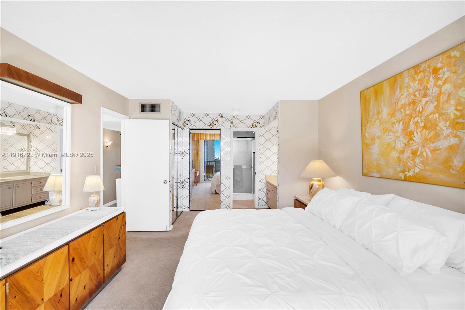 200 Ocean Trail Way, Unit 609 Jupiter, FL 33477 - Photo 12 of 27 a bed room with a bed and a large window